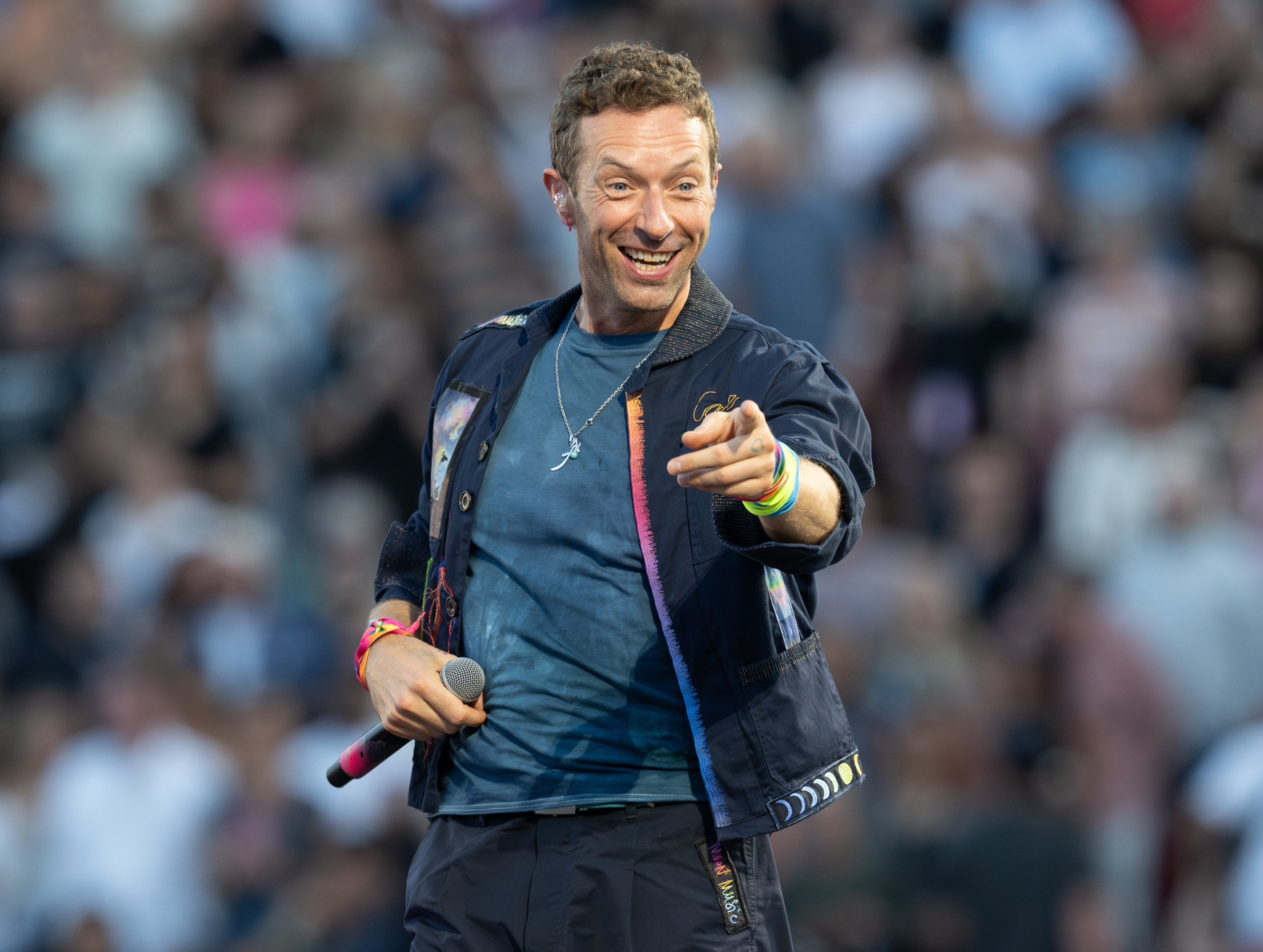 Chris Martin of Coldplay performs on Opening Night of the US leg of Music of the Spheres World Tour at Stanford Stadium.