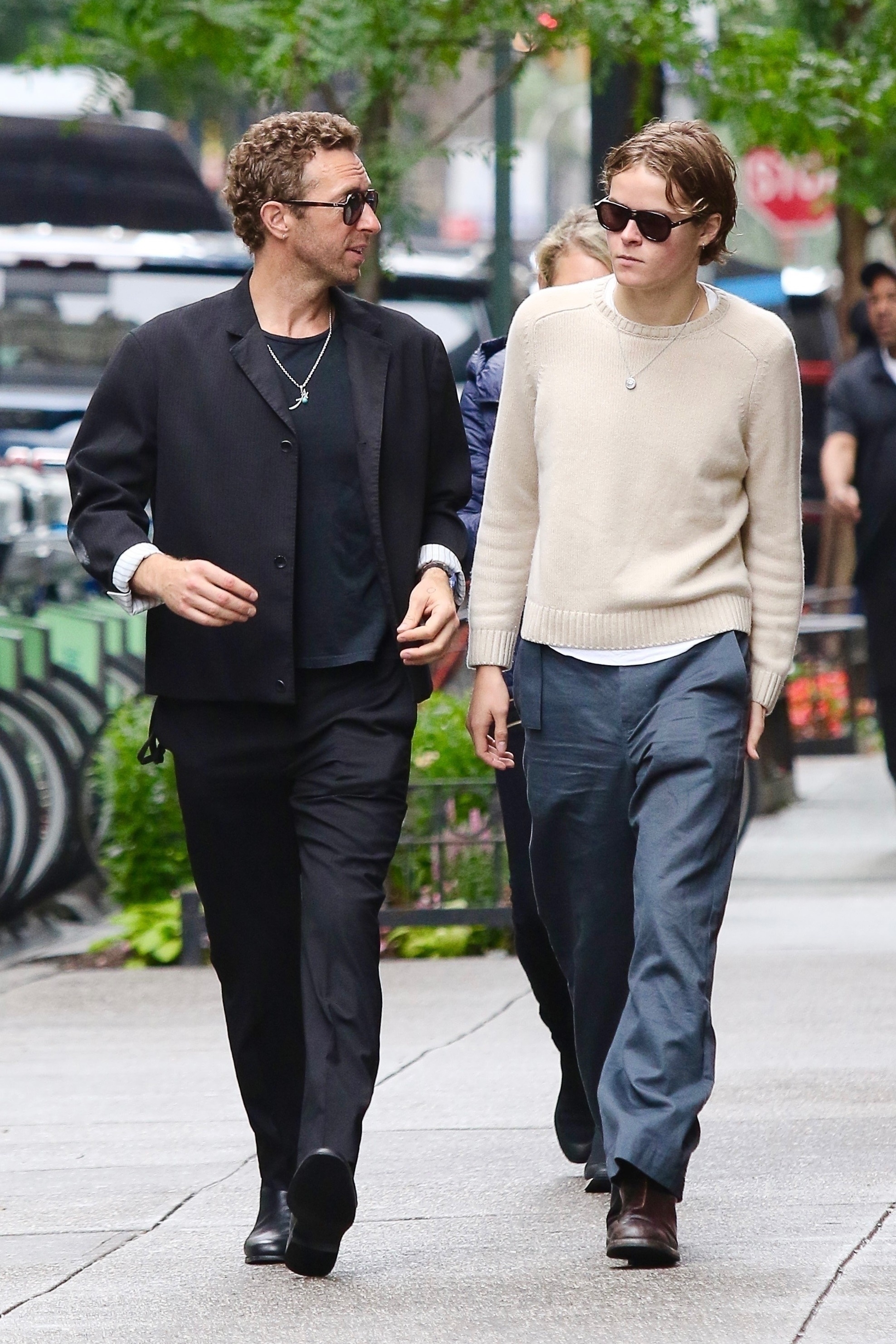 Chris Martin and his 19-year-old son Moses walking together in Midtown Manhattan.
