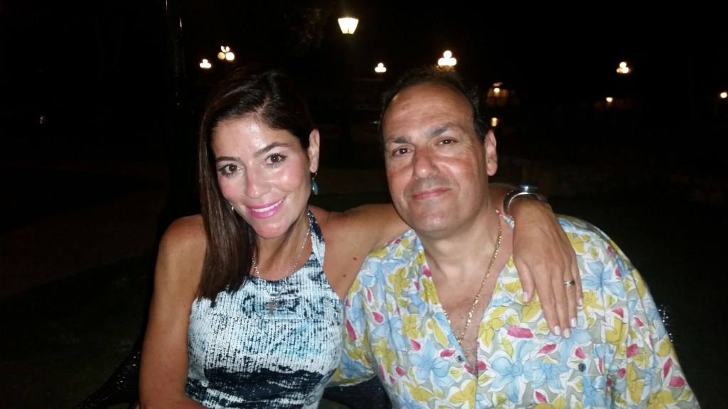 Christina Theodosiou and a man posing for a photo.