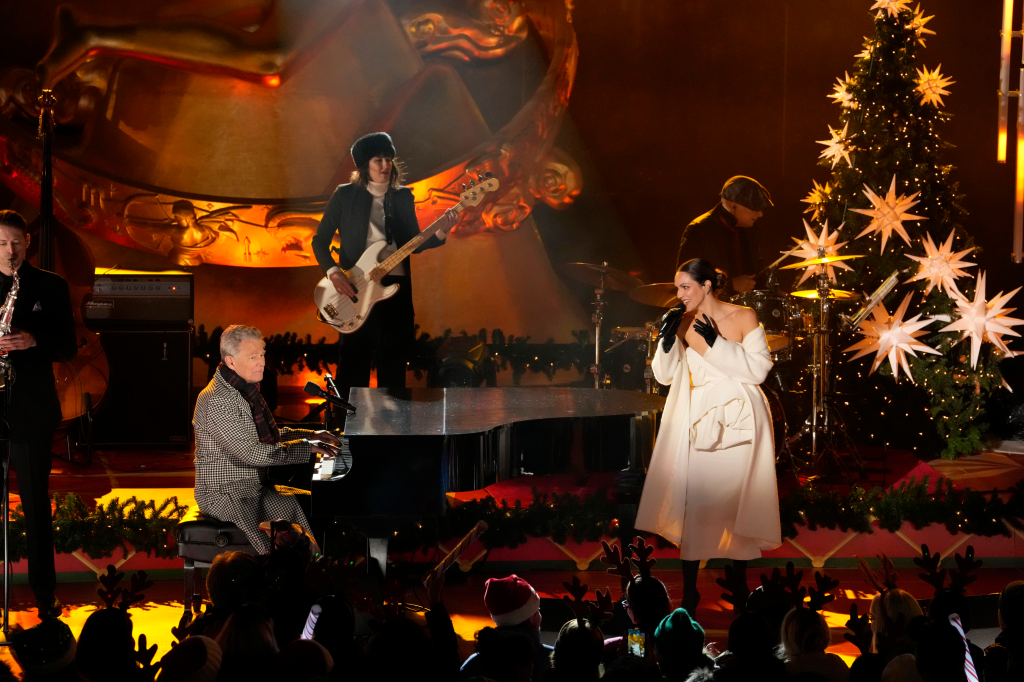 David Foster, Katharine McPhee, and band performing at Christmas in Rockefeller Center.