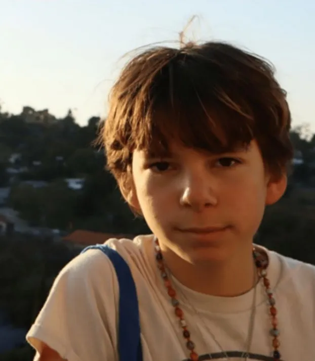 Cosmo Silverman looking into the camera.