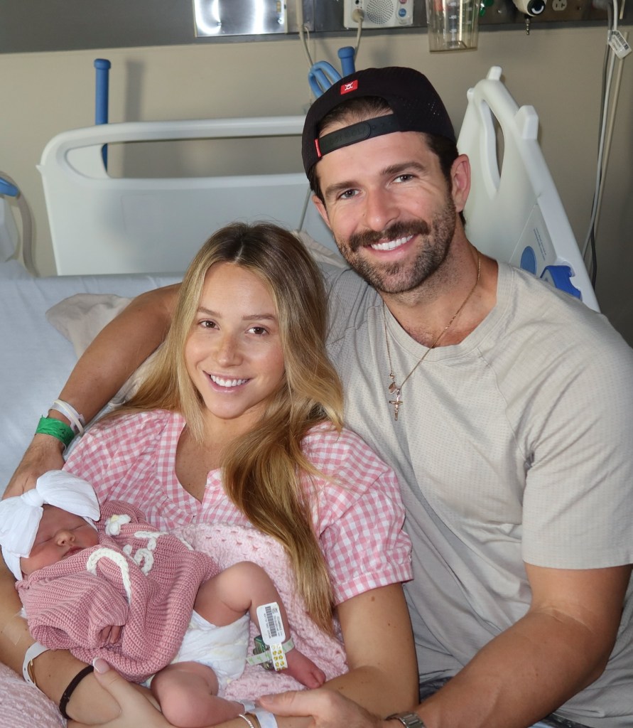 Jed Wyatt, Ellen Decker and their newborn daughter 