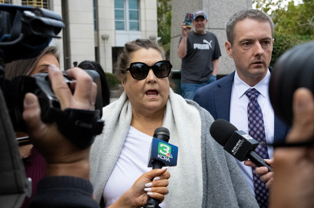 Dana Williamson, Gov. Gavin Newsom’s former chief of staff, speaks to reporters after her arrest in a federal public corruption probe.