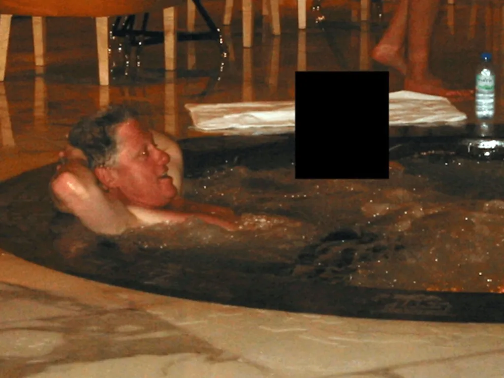 December 19, 2025, Unknown, Unknown, Unknown: DATE and LOCATION UNIDENTIFIED. The Department Of Justice has released files tied to convicted sex offender Jeffrey Epstein. Former President BILL CLINTON in a hot tub and a woman whose face has been redacted. (Credit Image: © Department Of Justice/ZUMA Press Wire)