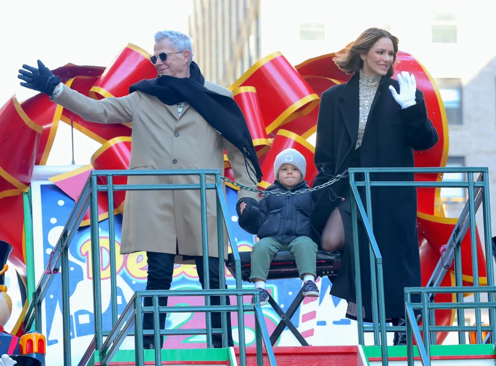 David Foster, Katharine McPhee, and their son Rennie Foster on a Macy's Thanksgiving Day Parade float.