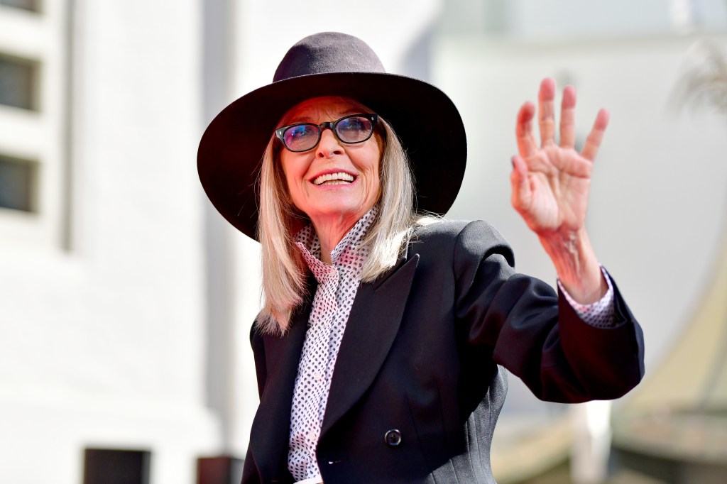 Diane Keaton waving to the audience.