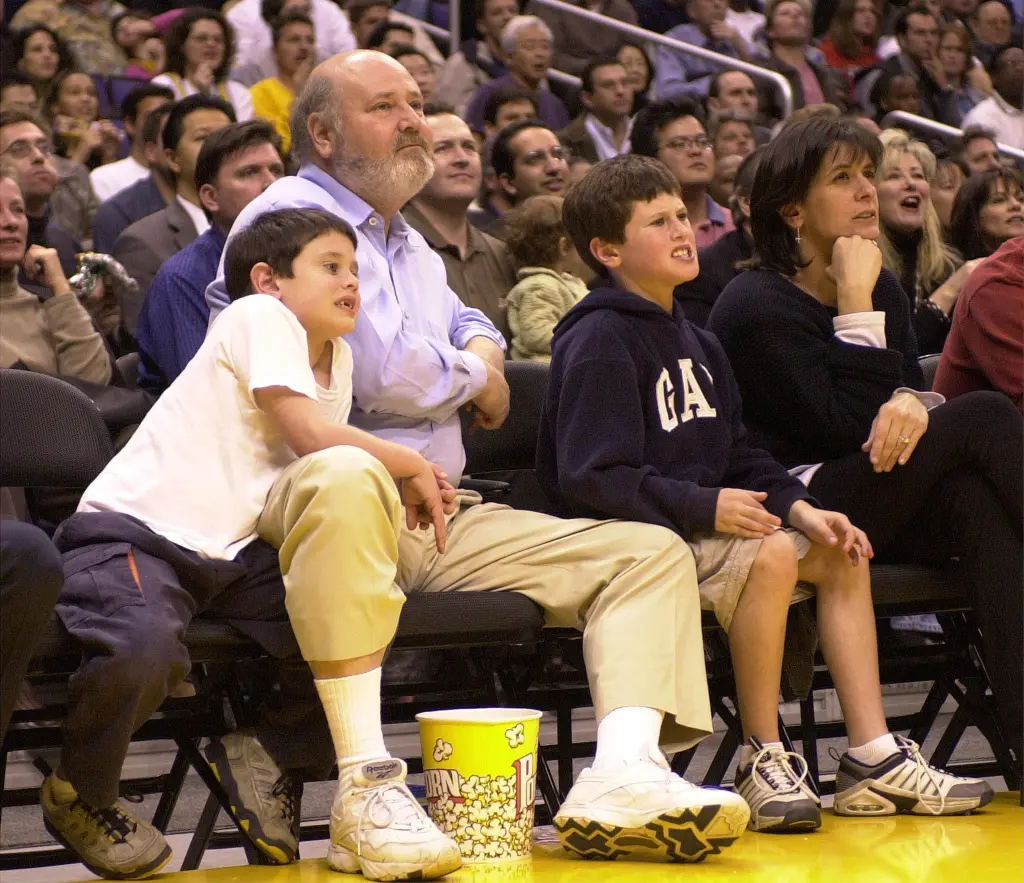 Rob Reiner and his family watch a Lakers game.