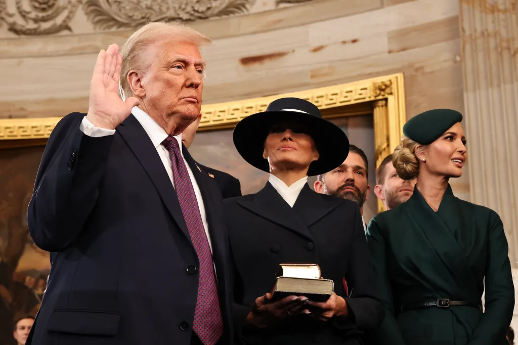 Donald Trump takes the oath of office with his wife Melania and daughter Ivanka by his side.