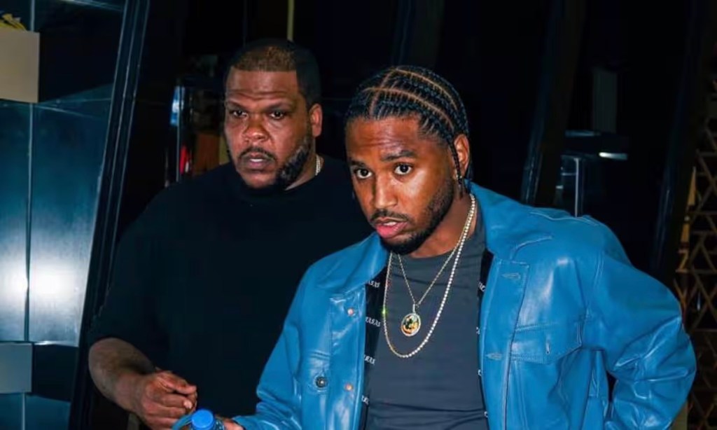 Cornell Whitfield with Trey Songz.