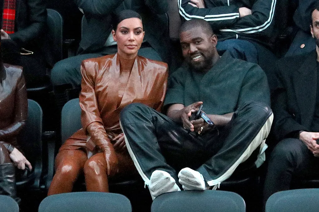 Kim Kardashian and Kanye West attend the Balenciaga show at Paris Fashion Week in March 2020