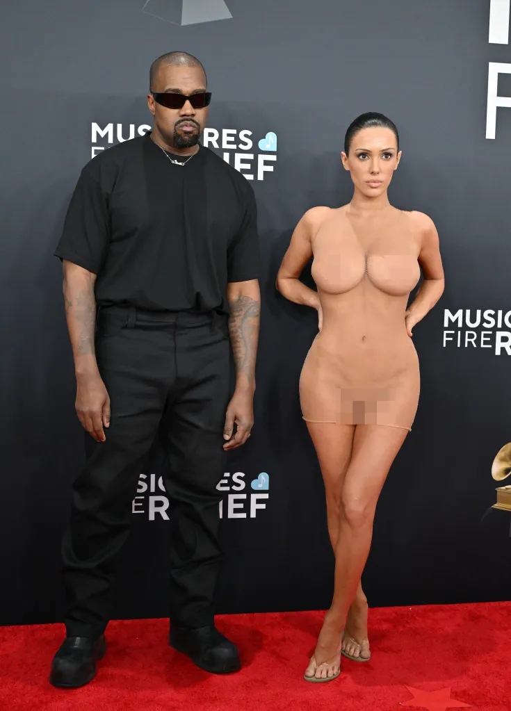 Kanye West and Bianca Censori on a red carpet at the 67th GRAMMY Awards.