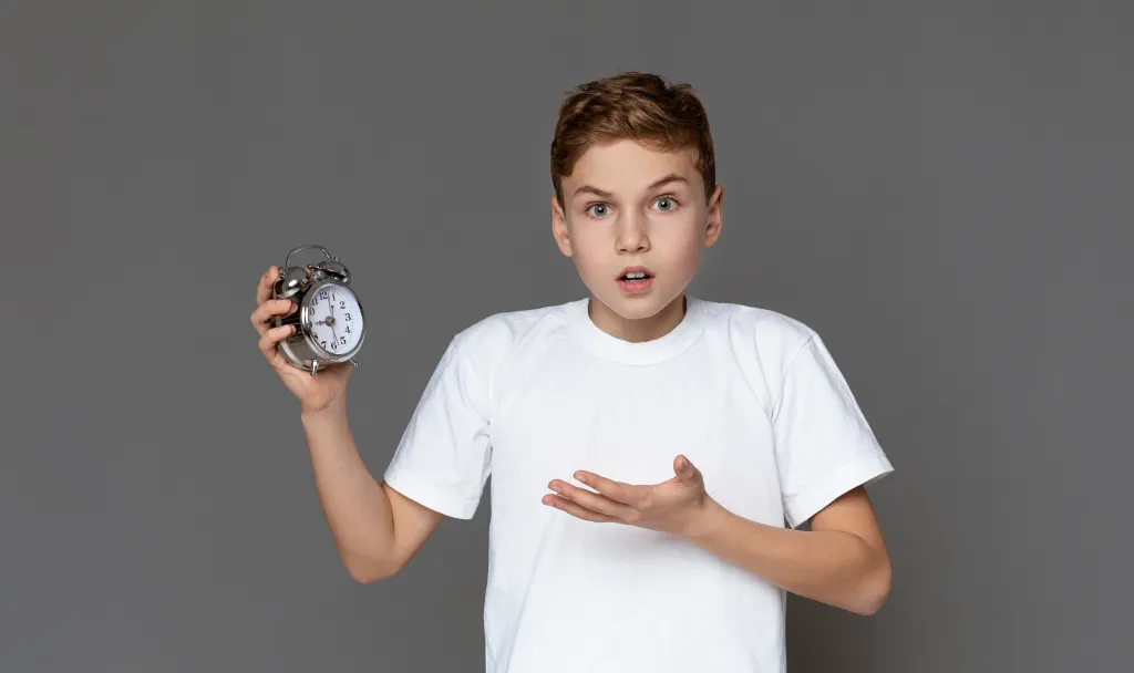 teen with clock