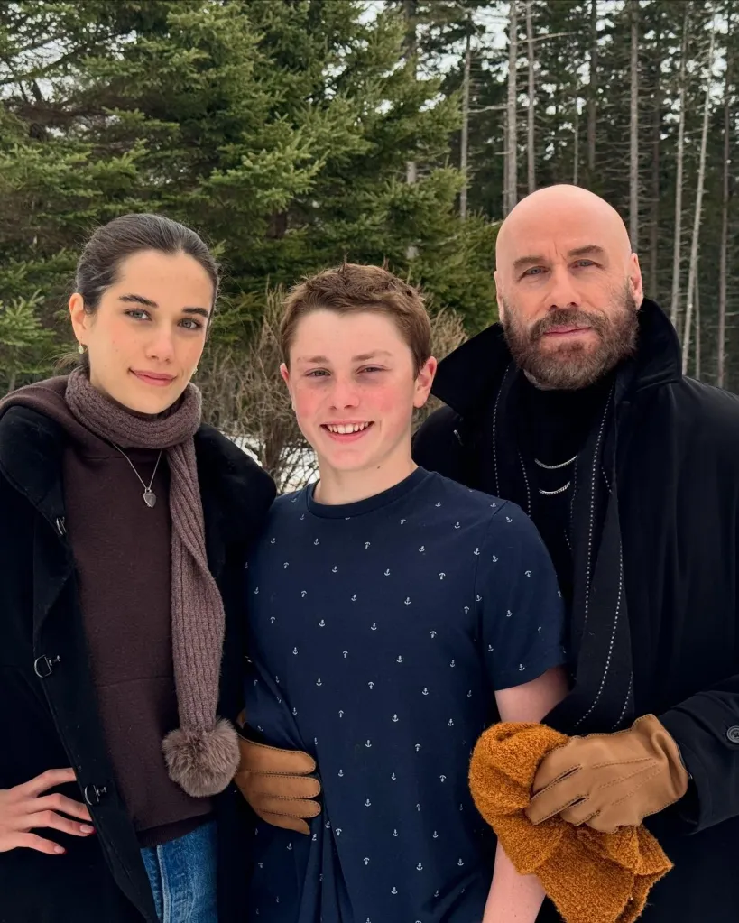 Ella Travolta, Benjamin Travolta, and John Travolta in a snowy forest.