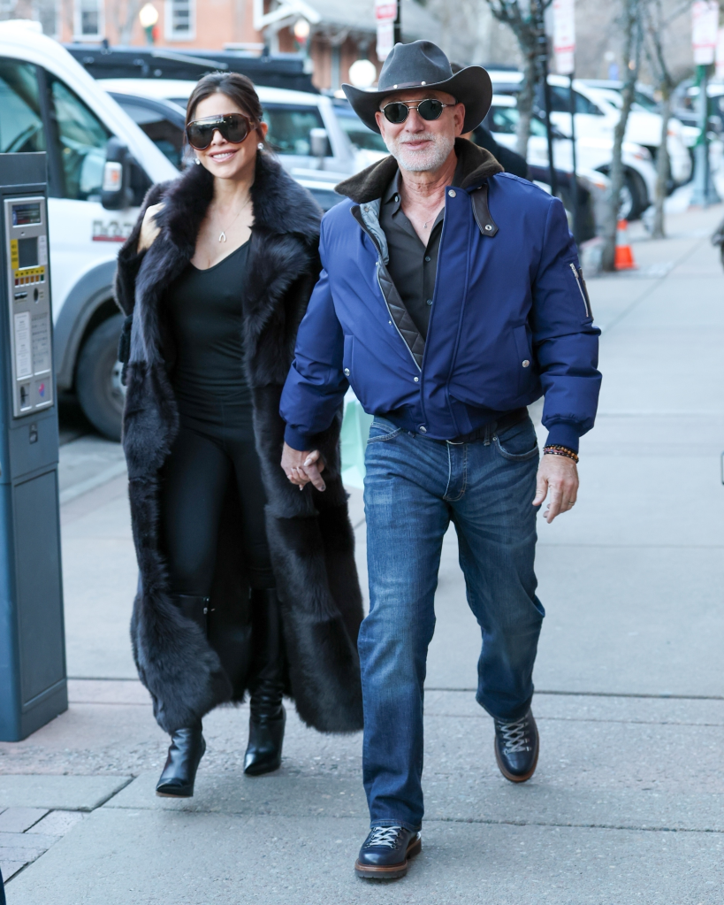 Jeff Bezos and Lauren Sanchez walking in Aspen after Dior shopping.
