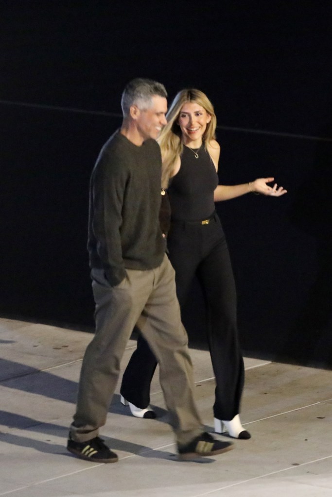 Cash Warren and Seanna Pereira smiling after a romantic dinner.