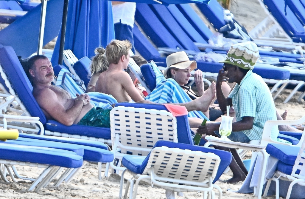 Liev Schreiber enjoying a beach day with his family in Barbados.