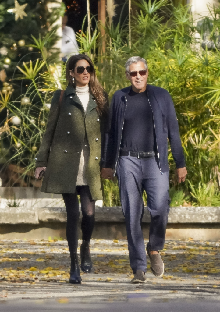 George and Amal Clooney walk hand-in-hand in Géménos.