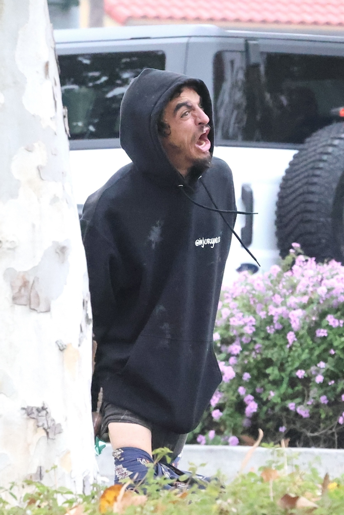 Tylor Chase yelling in a parking lot.