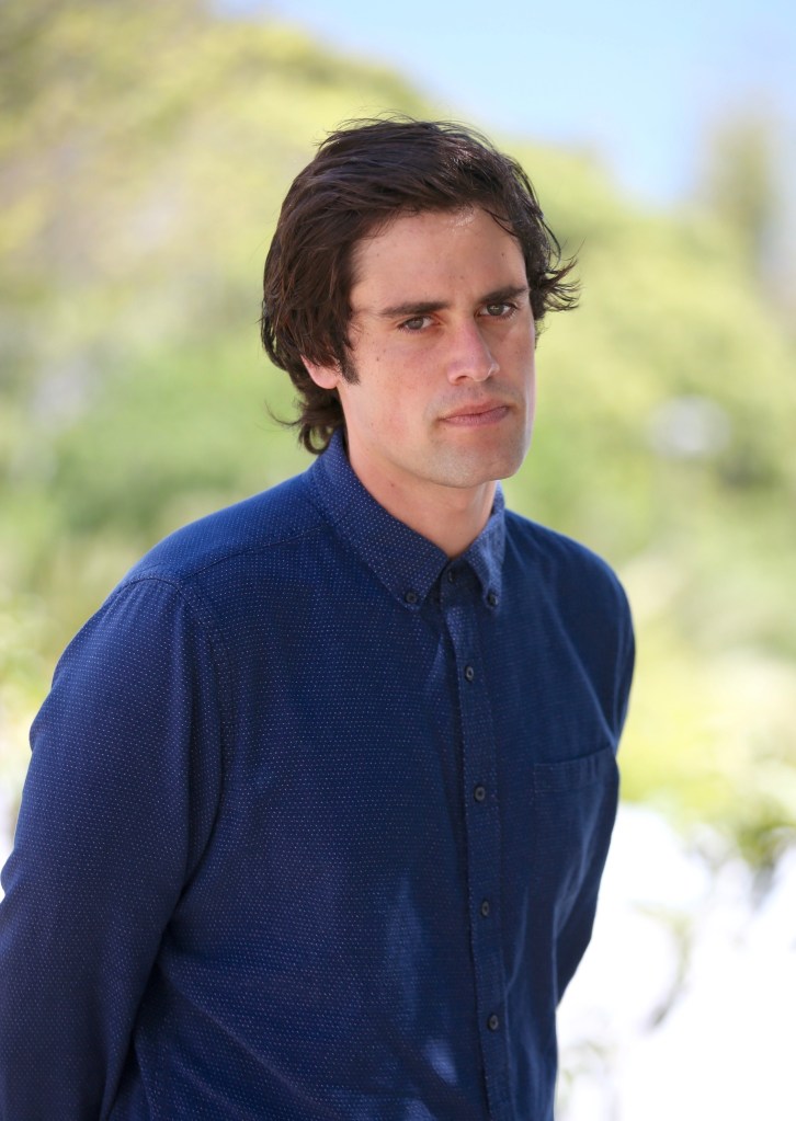 Nick Reiner posing for a portrait photoshoot.