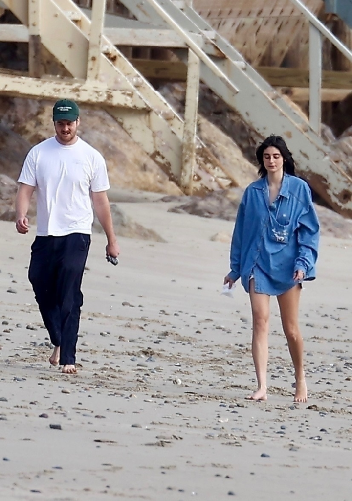 Alex Siliberg and Romy Reiner with their dog on Malibu beach.
