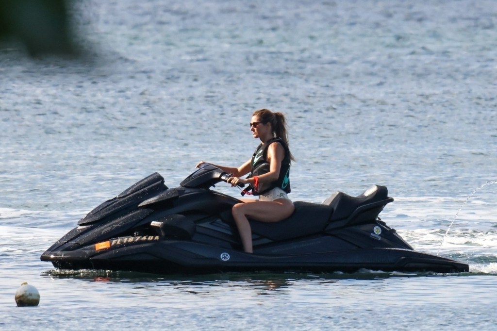 Gisele Bündchen riding a jet ski on Miami Bay.