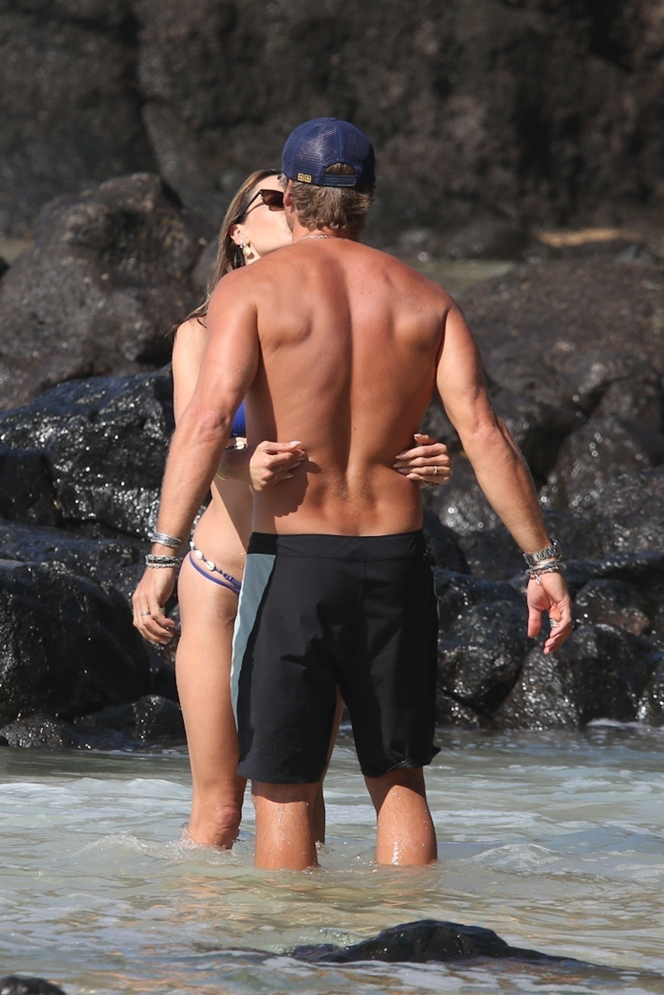 Alessandra Ambrosio and Buck Palmer kissing at Boda Beach.