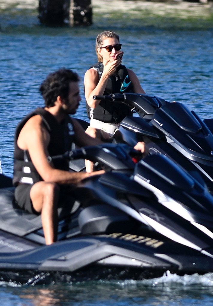 Gisele Bündchen and Joaquim Valente on jet skis in Surfside.
