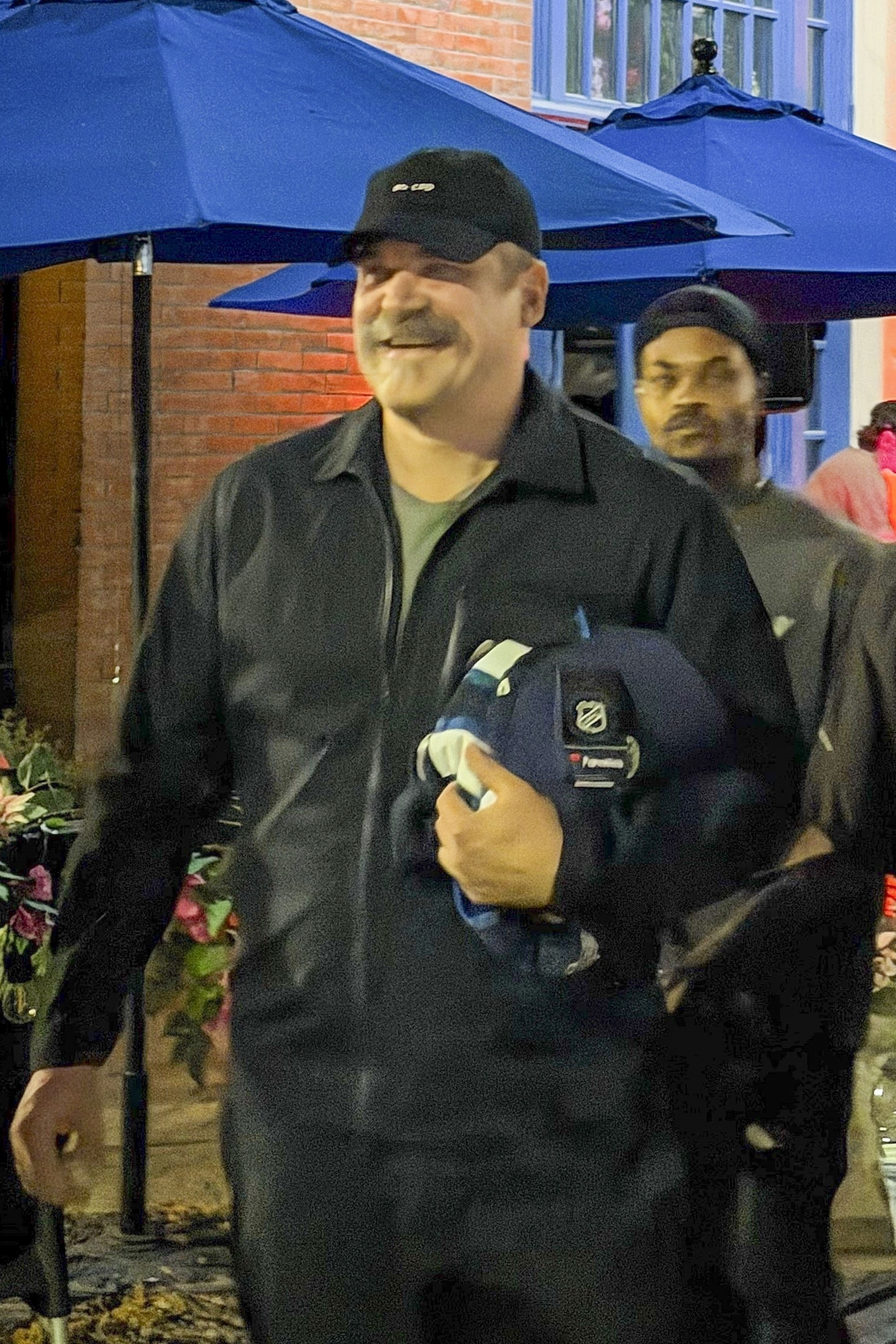David Harbour walking at Nuit Blanche in Winnipeg.