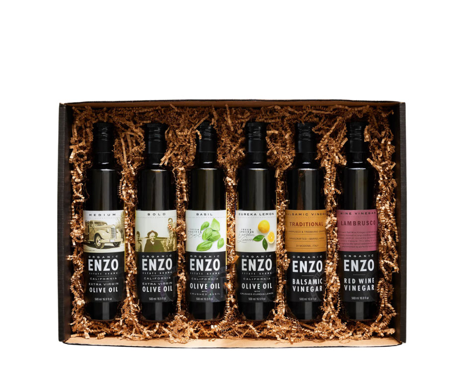 A gift box of six Enzo brand bottles of olive oil and vinegar.