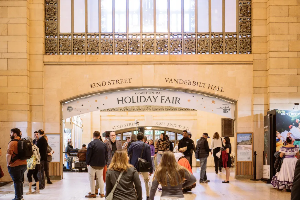 People gather for the Grand Central Holiday Fair in Vanderbilt Hall.