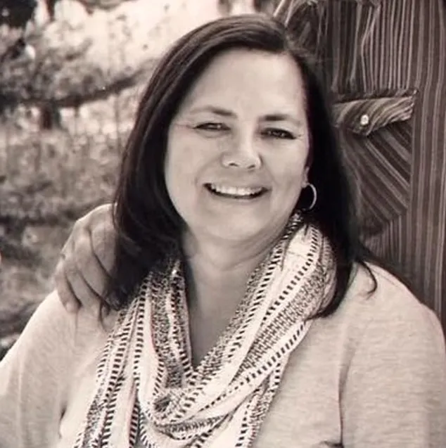 Kerri Ann Abatti, the estranged wife of a farming tycoon, smiling.