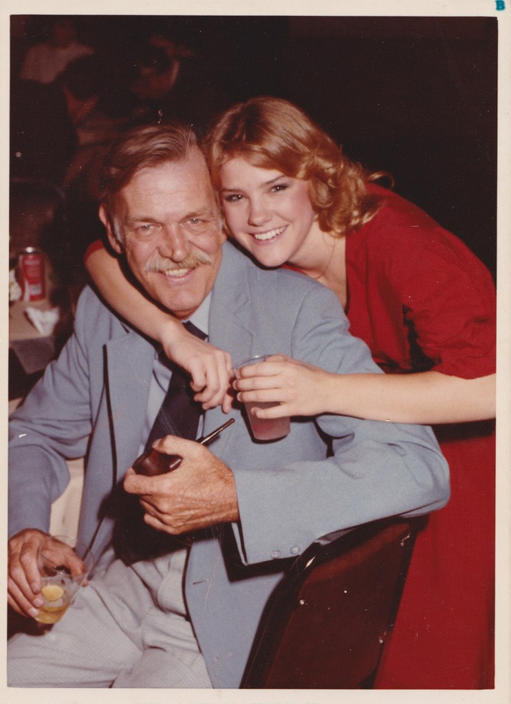 Chris and her father at a sorority event.