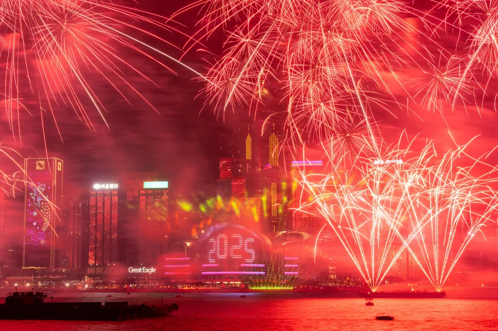 Fireworks exploding over Victoria Harbour in Hong Kong to celebrate the start of 2025.