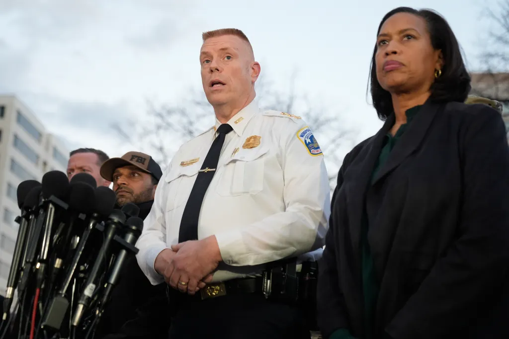 Metropolitan Police Department Executive Assistant Chief Jeffery Carroll and District of Columbia Mayor Muriel Bowser at a press conference.