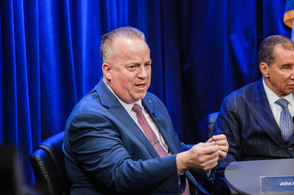 Former NYPD Chief John Chell speaking at a roundtable discussion.