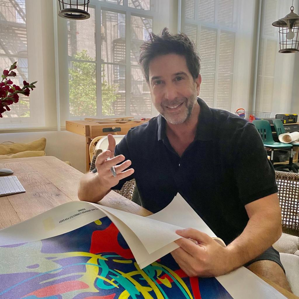 David Schwimmer with an abstract art print.