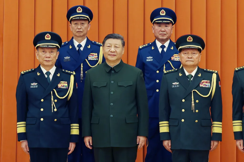 Chinese President Xi Jinping with newly promoted generals Yang Zhibin and Han Shengyan.