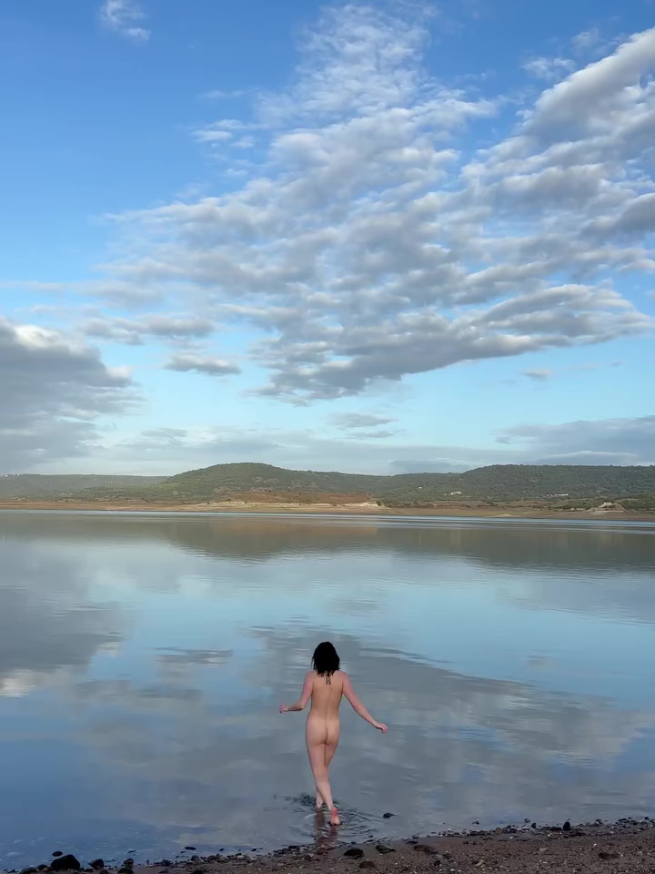 Maisie Williams skinny dipping in a lake in Italy.