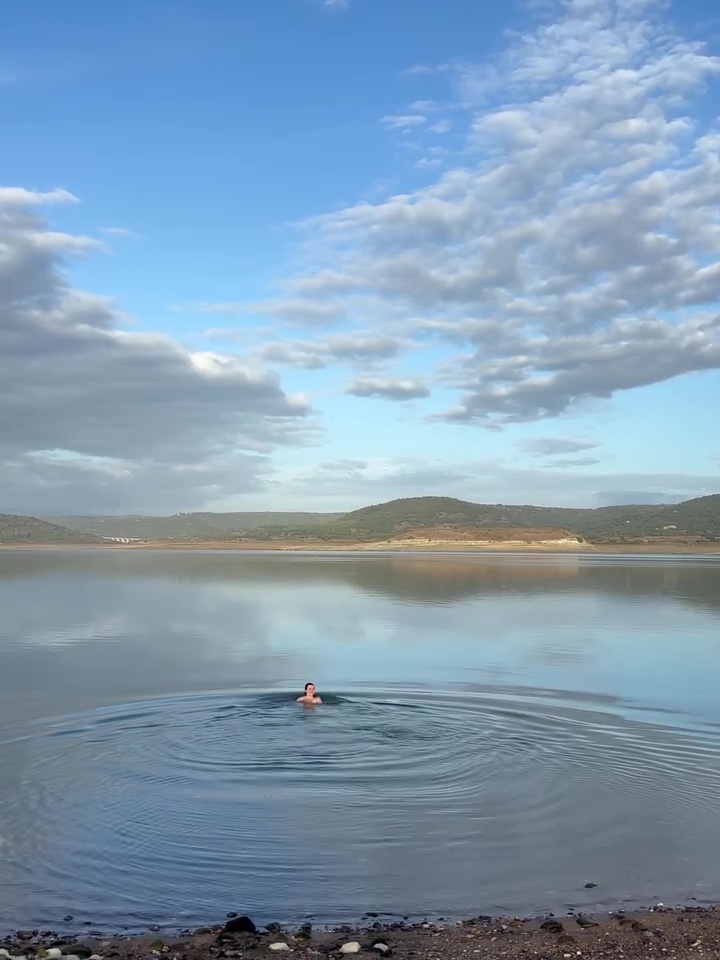 Maisie Williams skinny dipping in a lake in Italy.
