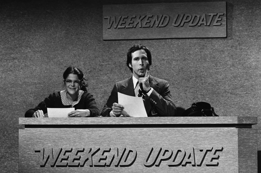 Gilda Radner as Emily Litella, Chevy Chase during Weekend Update on January 24, 1976.