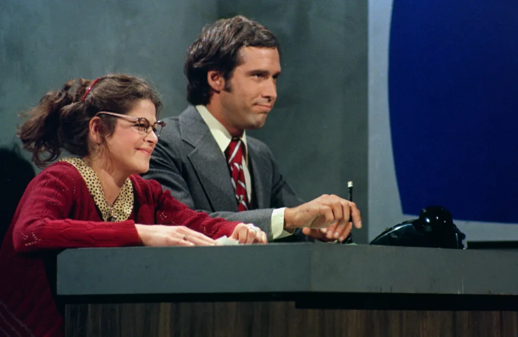 Gilda Radner as Roseanne Roseannadanna, Chevy Chase during 