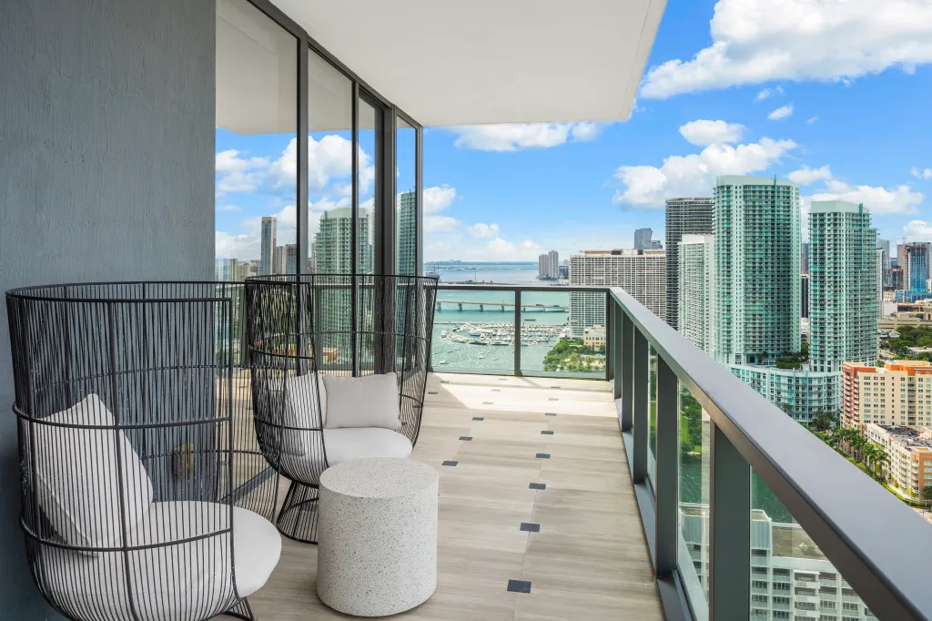 The terrace showcases city skyline and water views