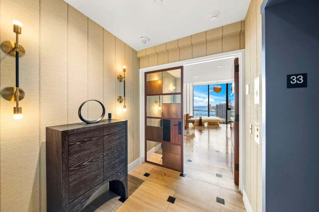 A private elevator landing opens into the foyer of the full floor apartment 