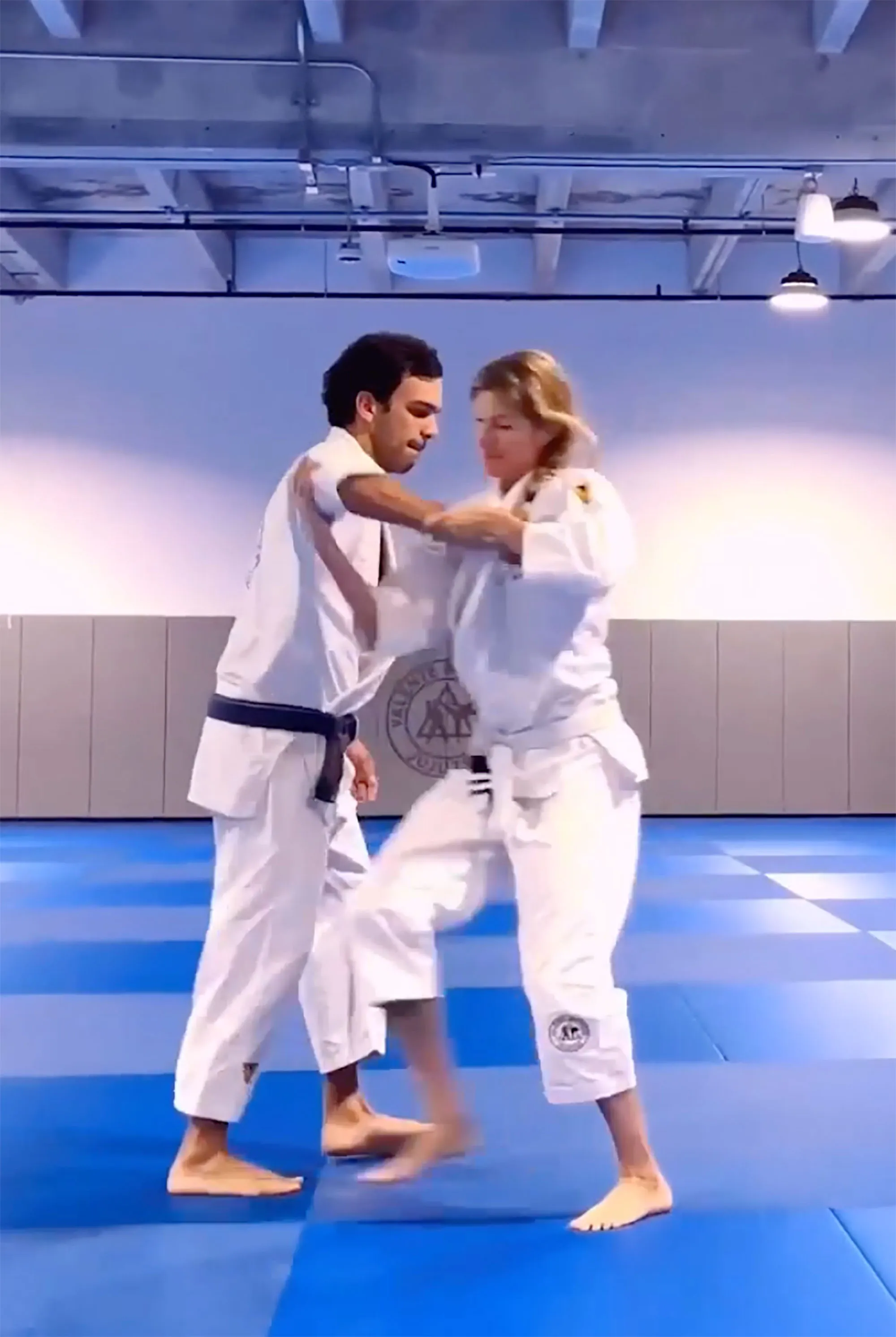 Gisele Bündchen practicing jiu-jitsu with instructor Joaquim Valente.