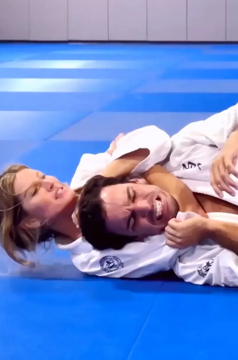 Gisele Bündchen practicing jiu-jitsu with instructor Joaquim Valente.