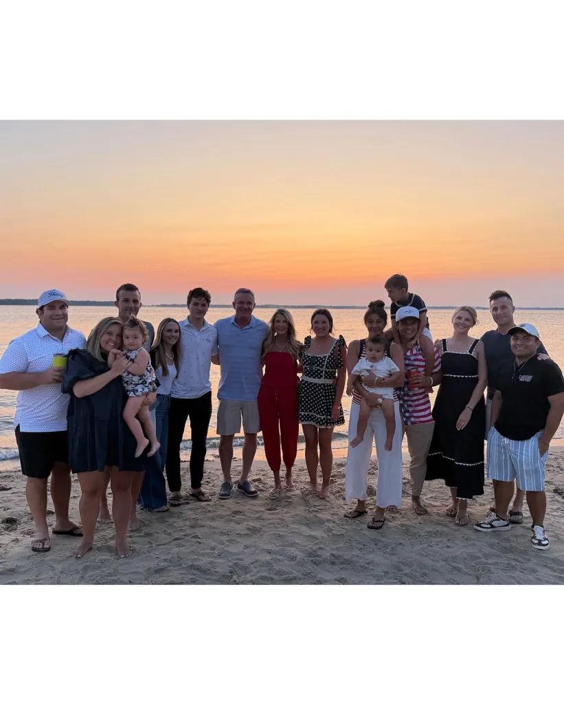 Joan Vassos and Chock Chapple pose for a family picture. 