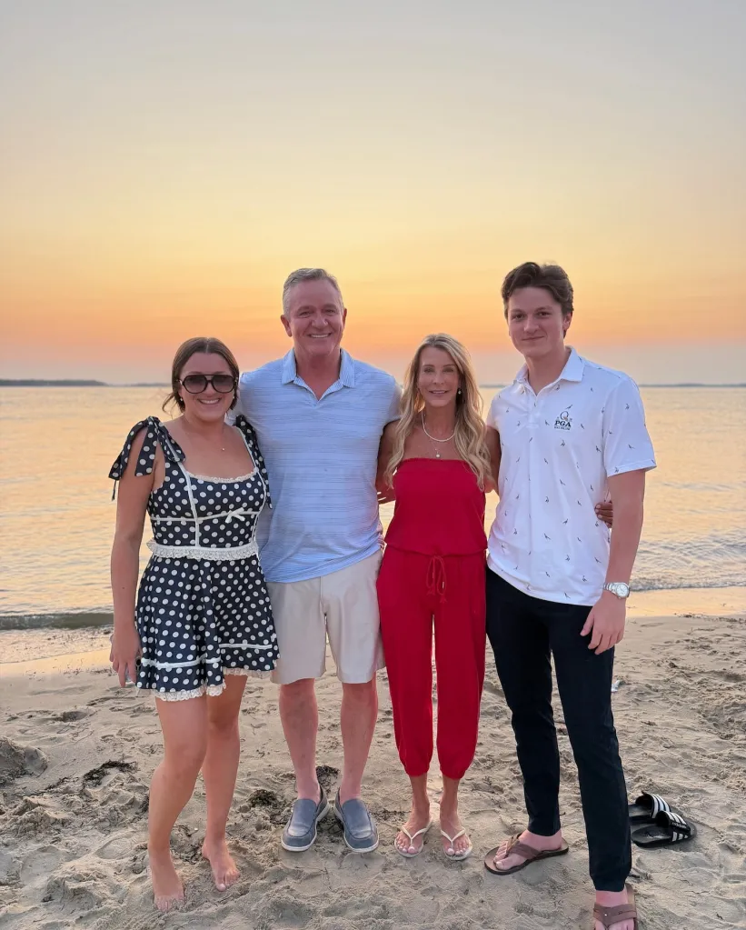 Joan Vassos poses with Chock Chapple and his kids. 