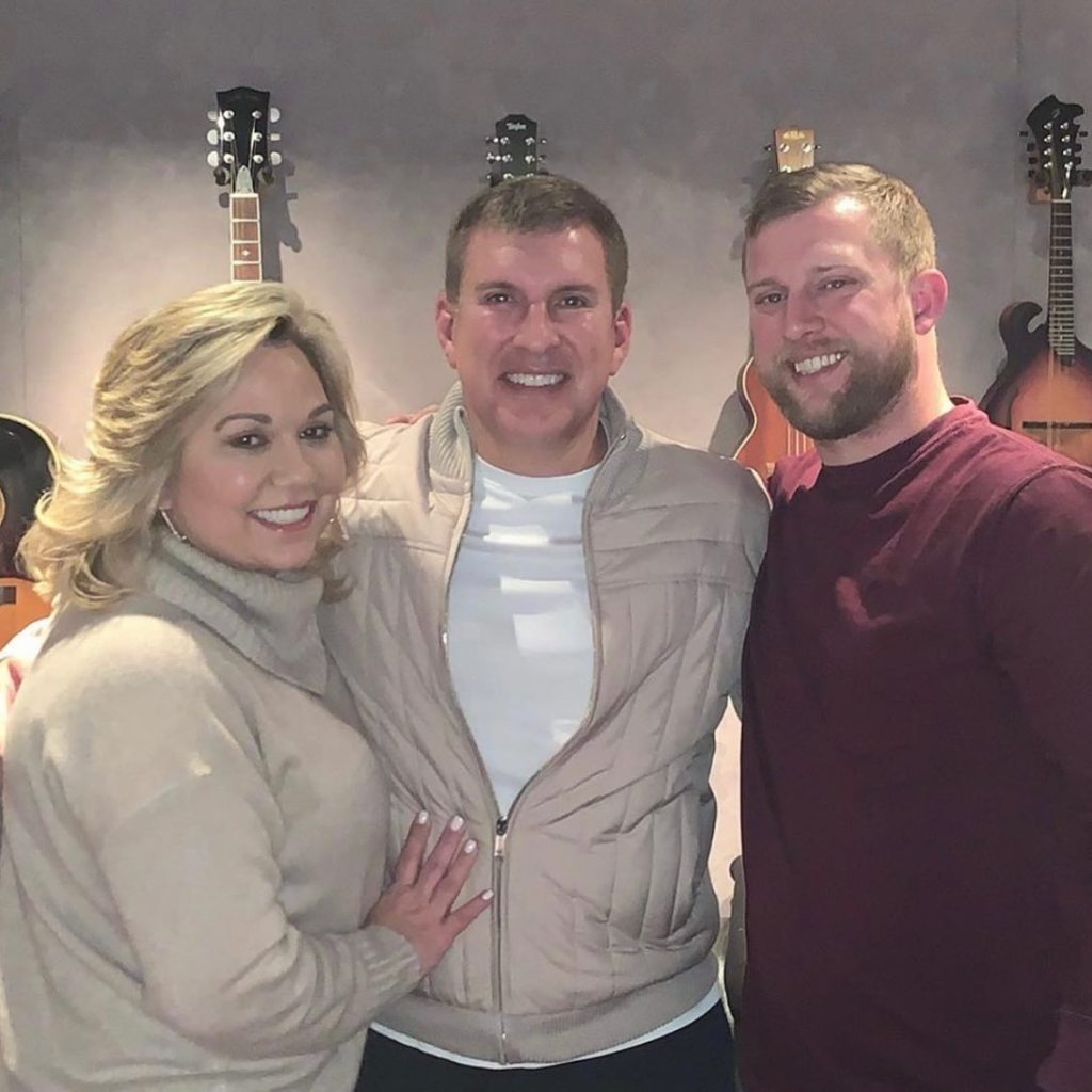 Kyle Chrisley with Julie and Todd Chrisley