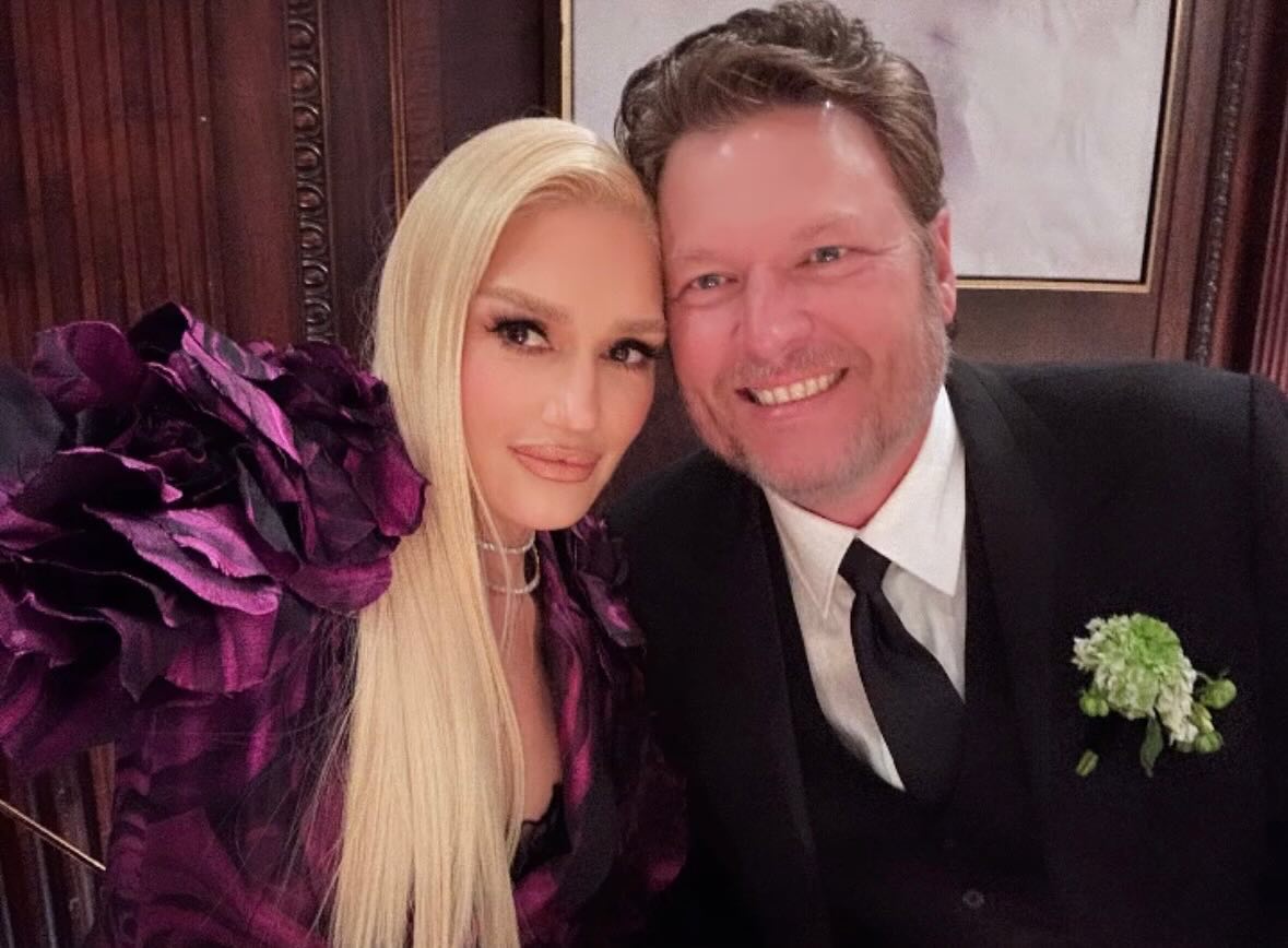 Gwen Stefani and Blake Shelton smiling together.
