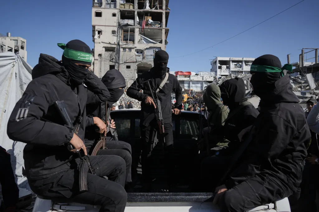 Hamas terrorists at the site where officials are searching for the remains of missing hostages in the northern Gaza Strip on Dec. 1, 2025.